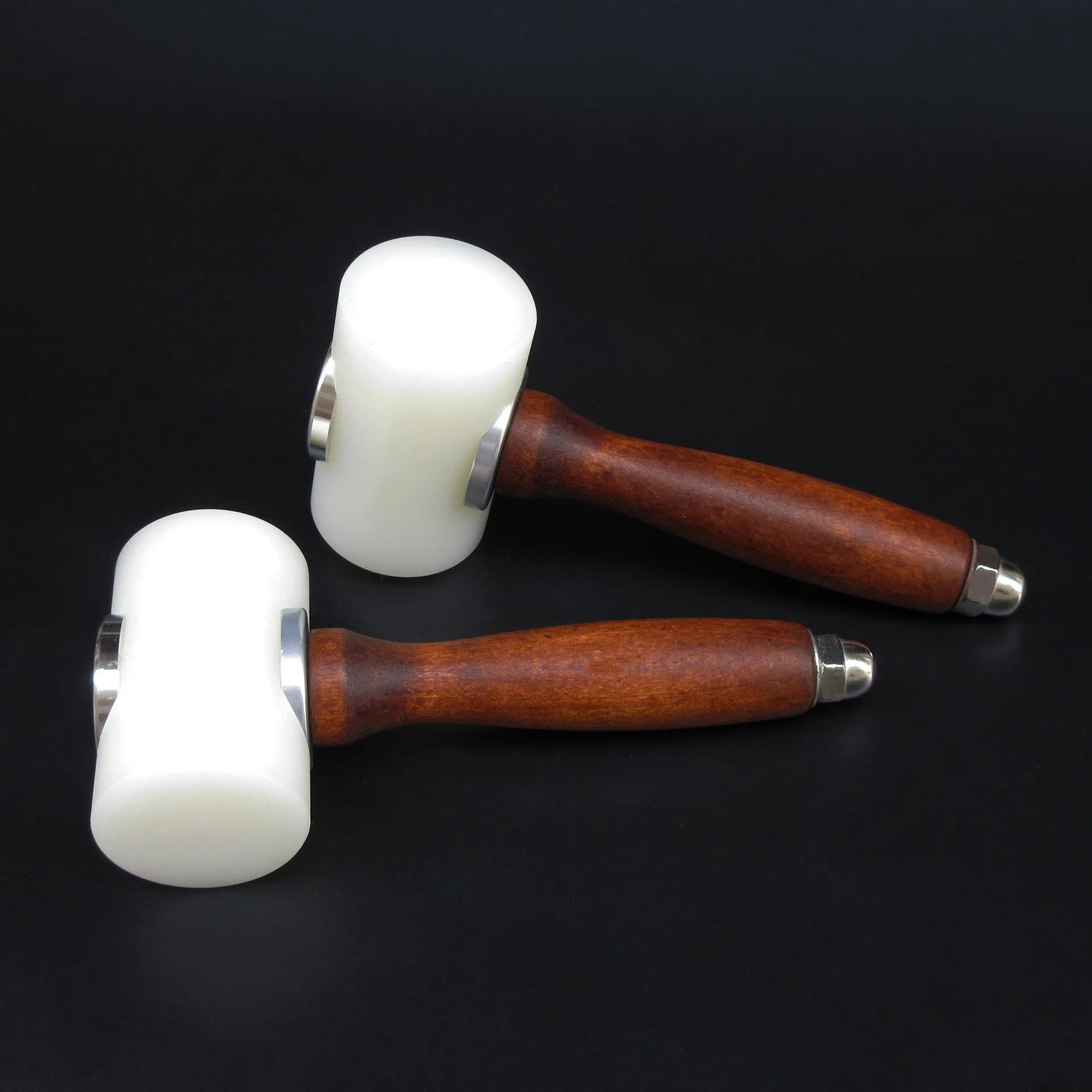 Brown handled T-shaped leather carving hammer with white nylon head for stamping and engraving