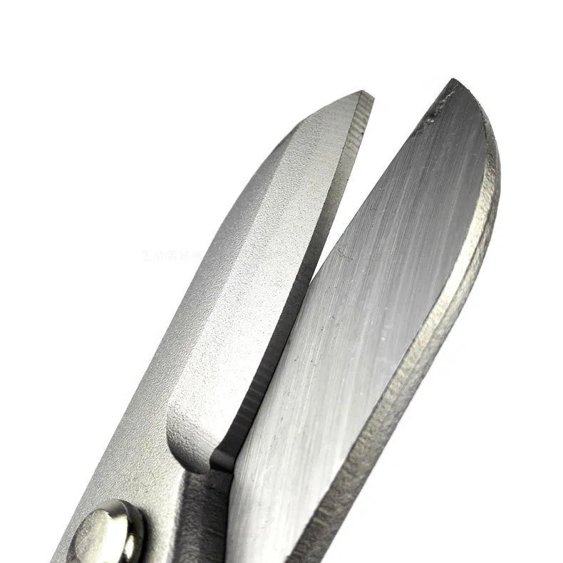 Yellow-handled high carbon steel barbed wire shears on a workbench