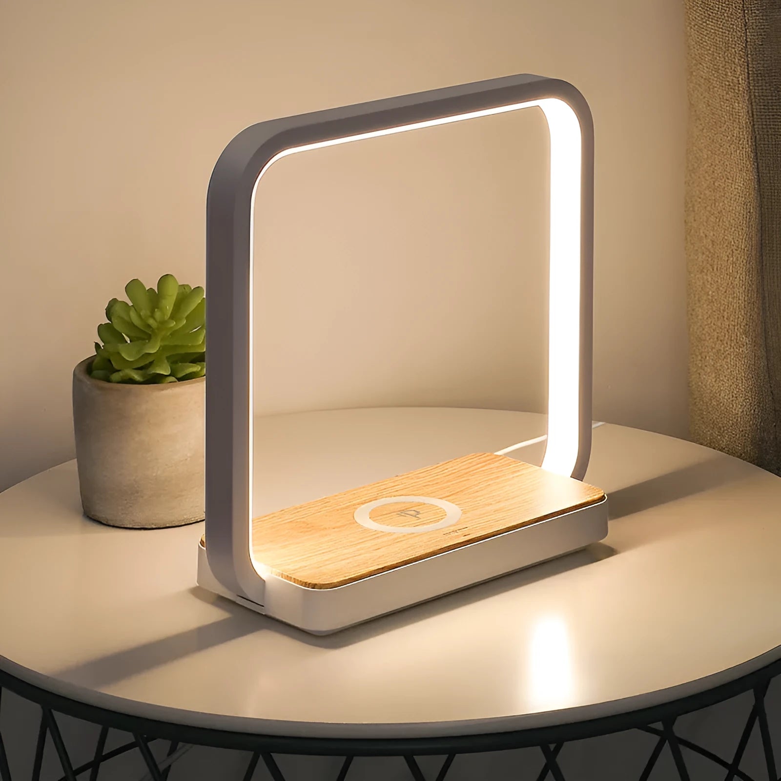 Modern smart bedside lamp with touch base and aluminium shade in white or gold, showing USB cable.