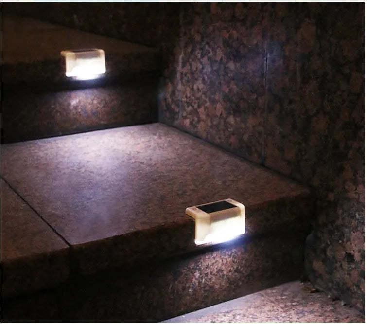 White solar railing light mounted on outdoor stair with LED illumination