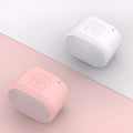 Mini Macaron Bluetooth speaker in white with compact design and built-in diaphragm for sound