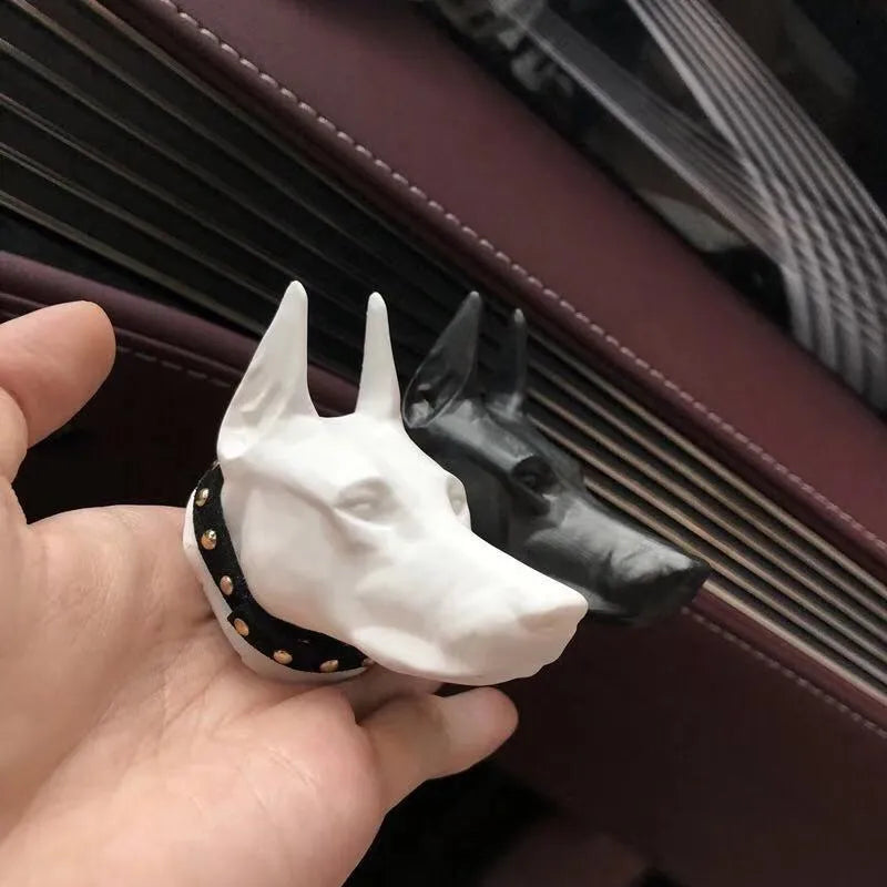 Doberman-shaped car air vent aromatherapy diffuser stone in black colour with clip attachment on car dashboard
