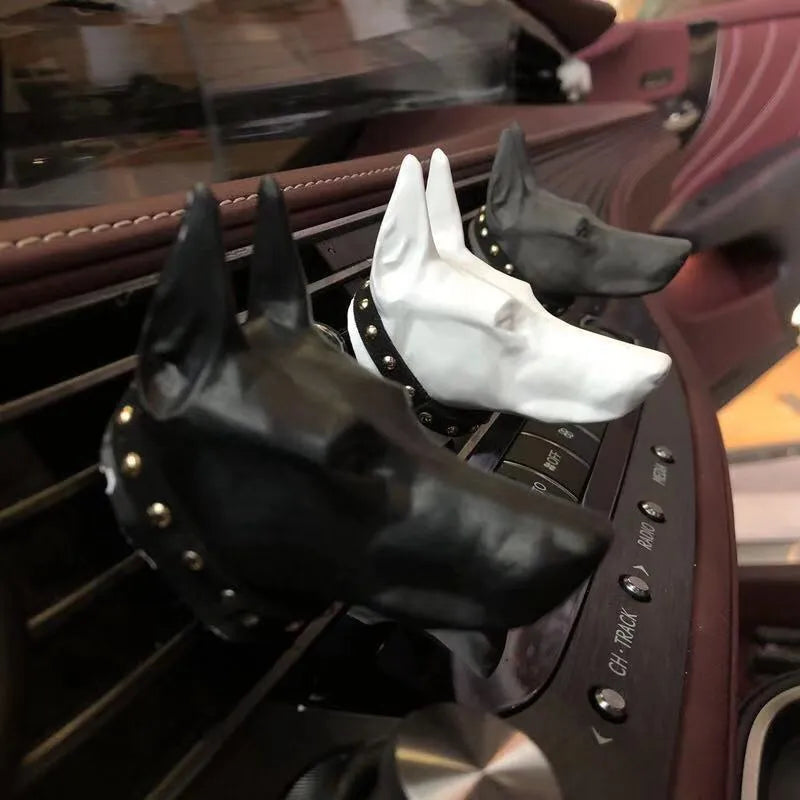 Doberman-shaped car air vent aromatherapy diffuser stone in black colour with clip attachment on car dashboard
