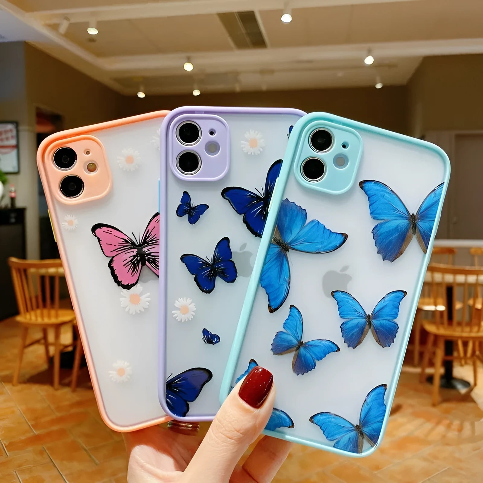 Butterfly pattern iPhone case in pink, purple or light blue colours with acrylic back and soft edges