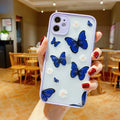 Butterfly pattern iPhone case in pink, purple or light blue colours with acrylic back and soft edges