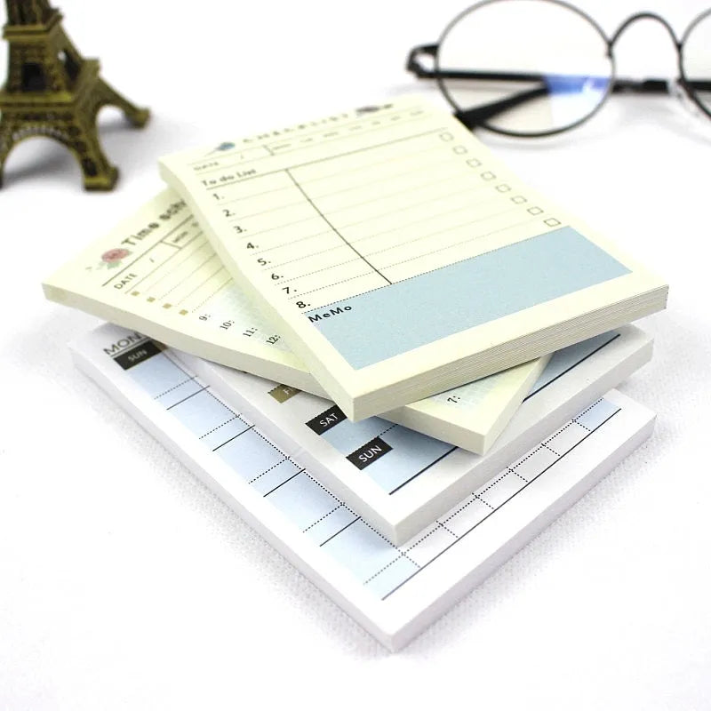 A5 work plan diary notebook showing four cover design options for weekly monthly planning