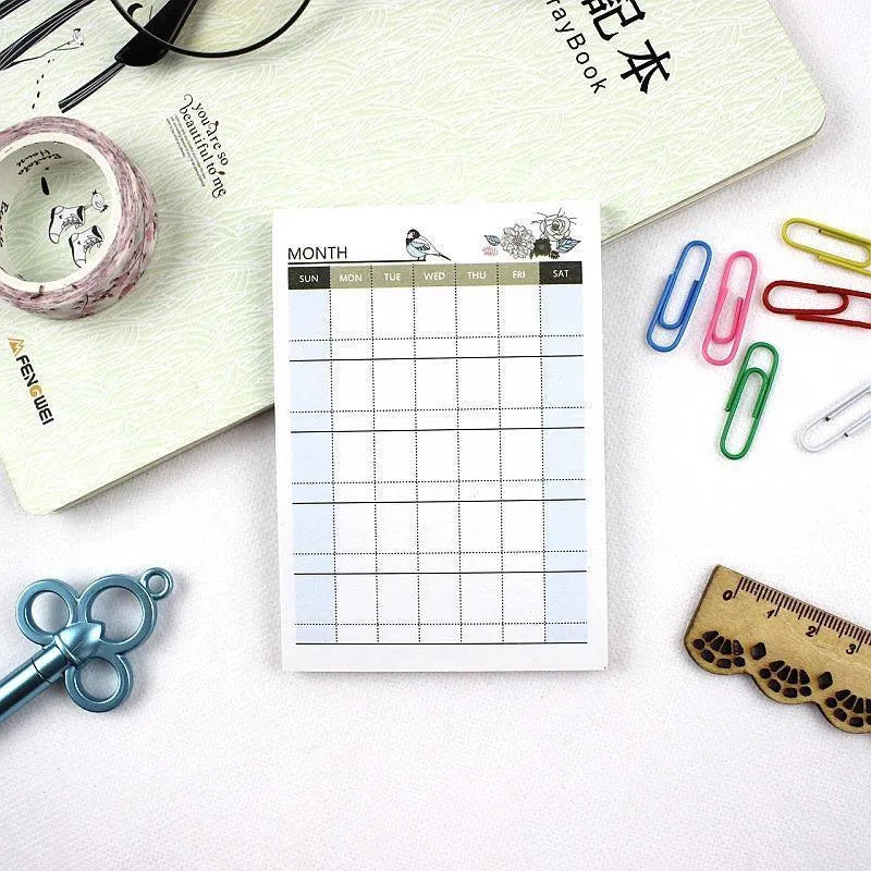 A5 work plan diary notebook showing four cover design options for weekly monthly planning