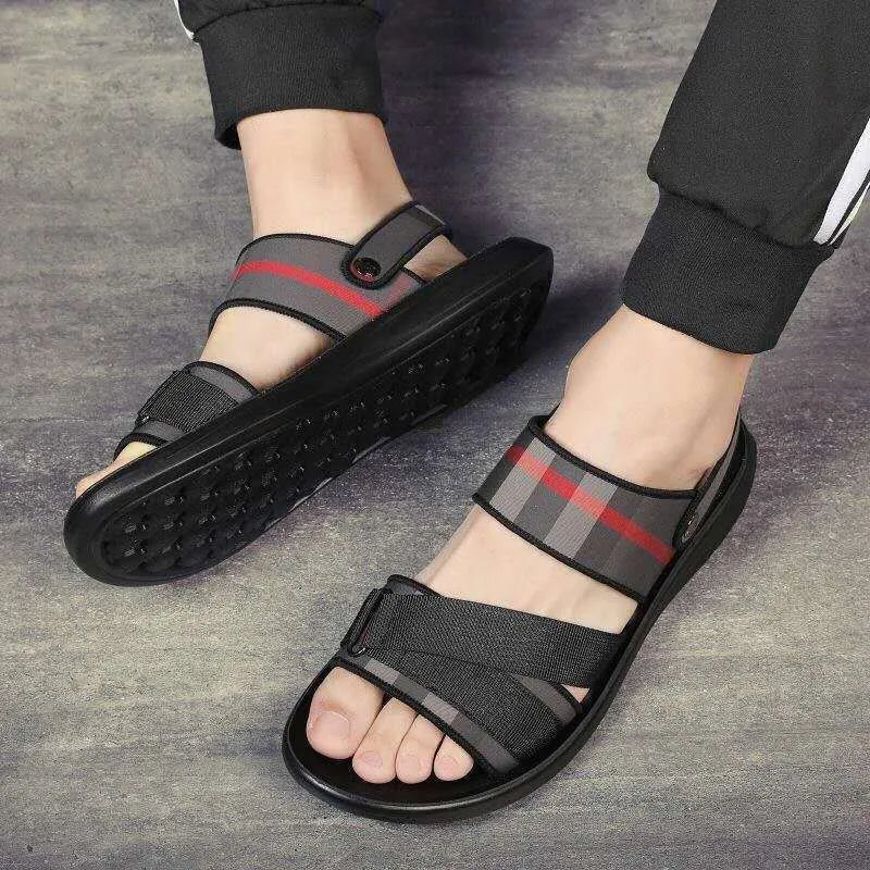 Youth leisure sandals with a light blue Lycra upper and polyurethane sole on a white background.