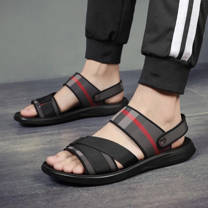 Youth leisure sandals with a light blue Lycra upper and polyurethane sole on a white background.