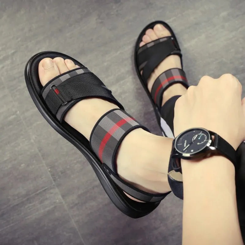 Youth leisure sandals with a light blue Lycra upper and polyurethane sole on a white background.