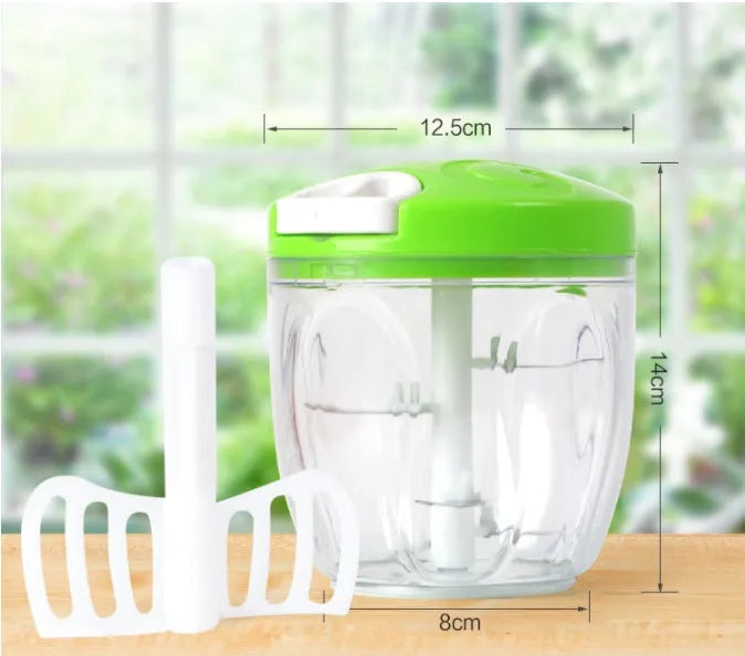 Green manual kitchen chopper grinder with three stainless steel blades and a 500ml transparent bowl.