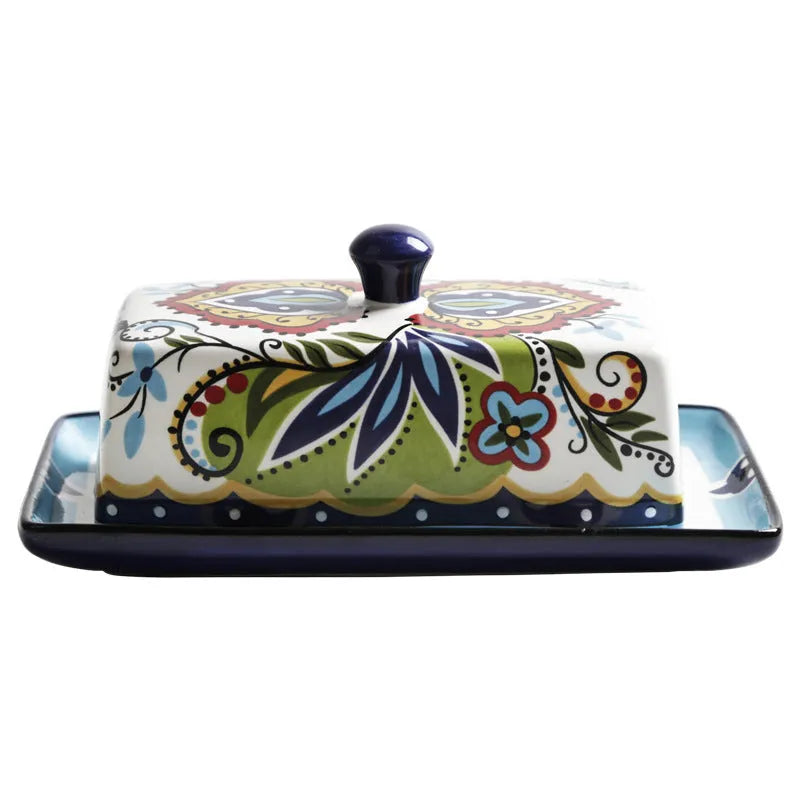 Square ceramic butter box with lid showing floral pattern, suitable for cutlery storage