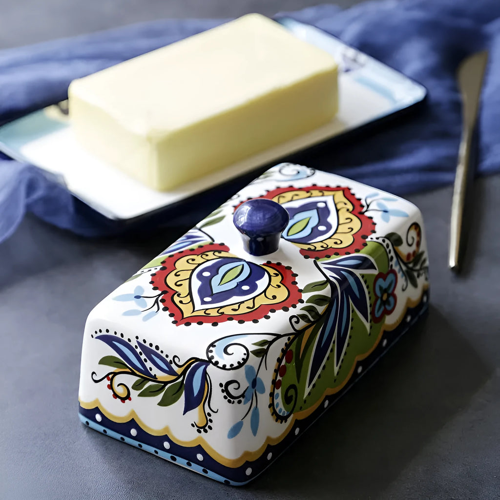 Square ceramic butter box with lid showing floral pattern, suitable for cutlery storage