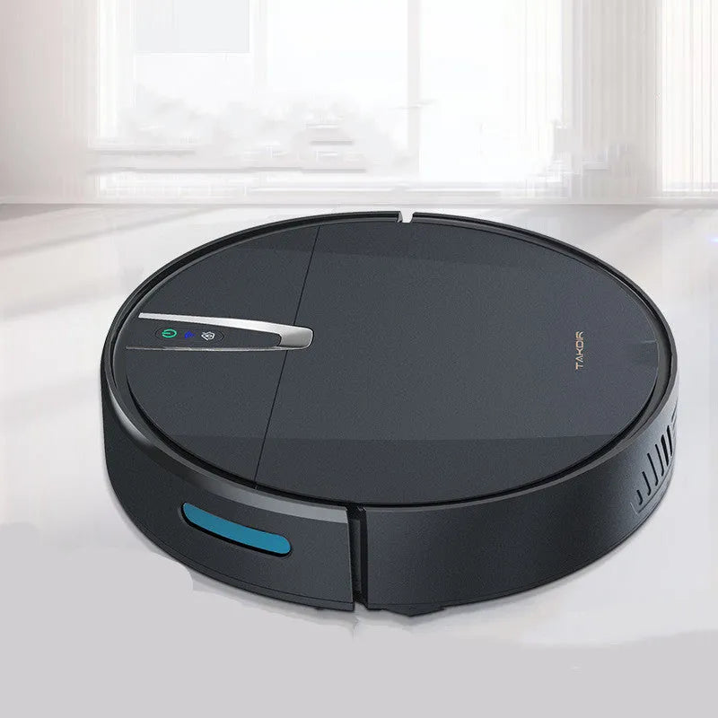 Black and white robotic floor cleaner with charging base and remote control