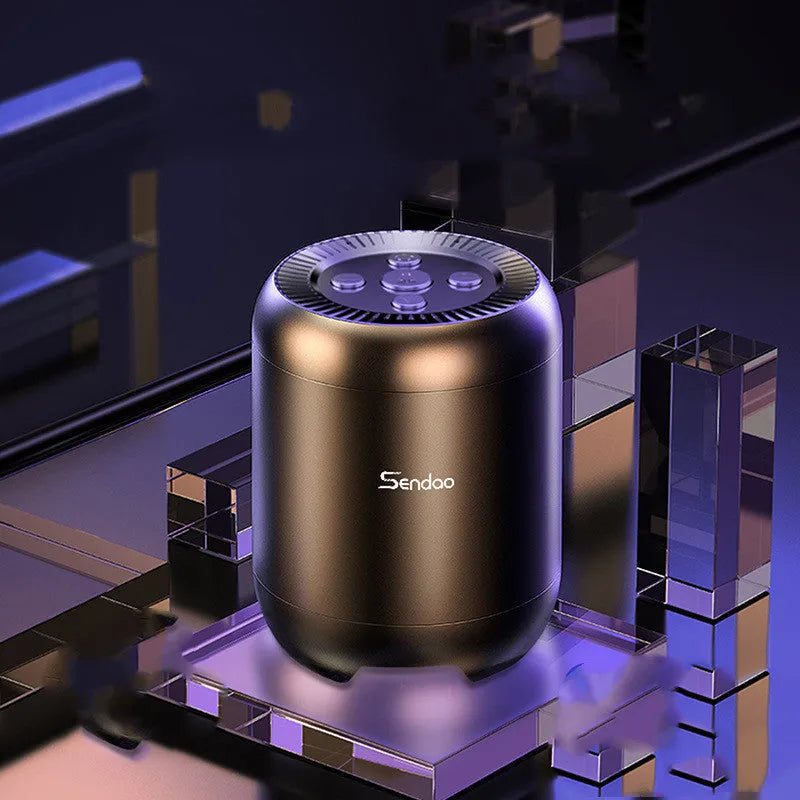 Compact black or white wireless Bluetooth speaker with USB port and card slot.