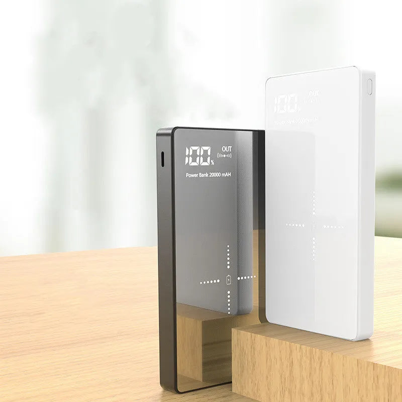 Black wireless charging power bank with digital display showing battery percentage, 20000mAh capacity