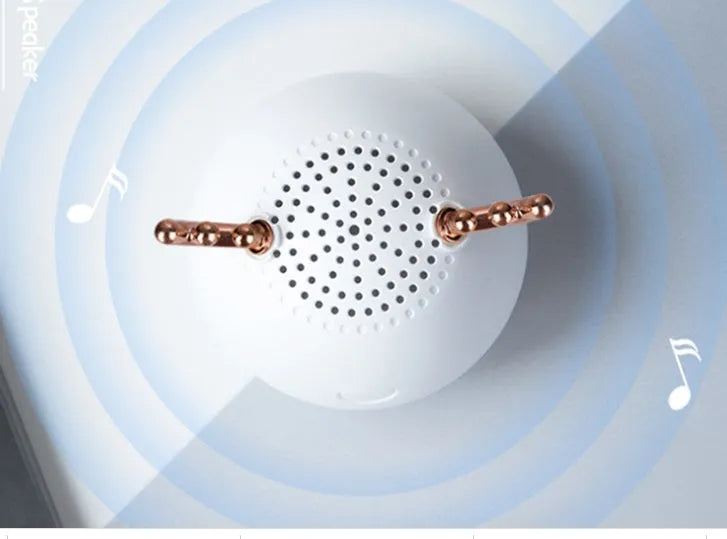 Compact Bluetooth speaker in white, pink or green colour measuring 75x88mm with USB charging port