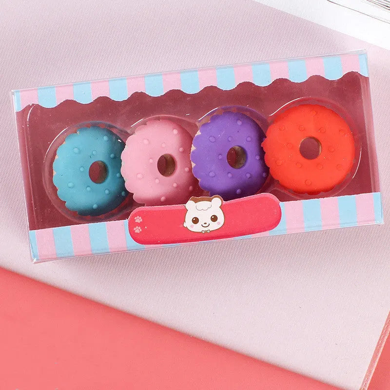 Set of 12 colourful cartoon erasers shaped like ice creams, lollipops, and donuts for children