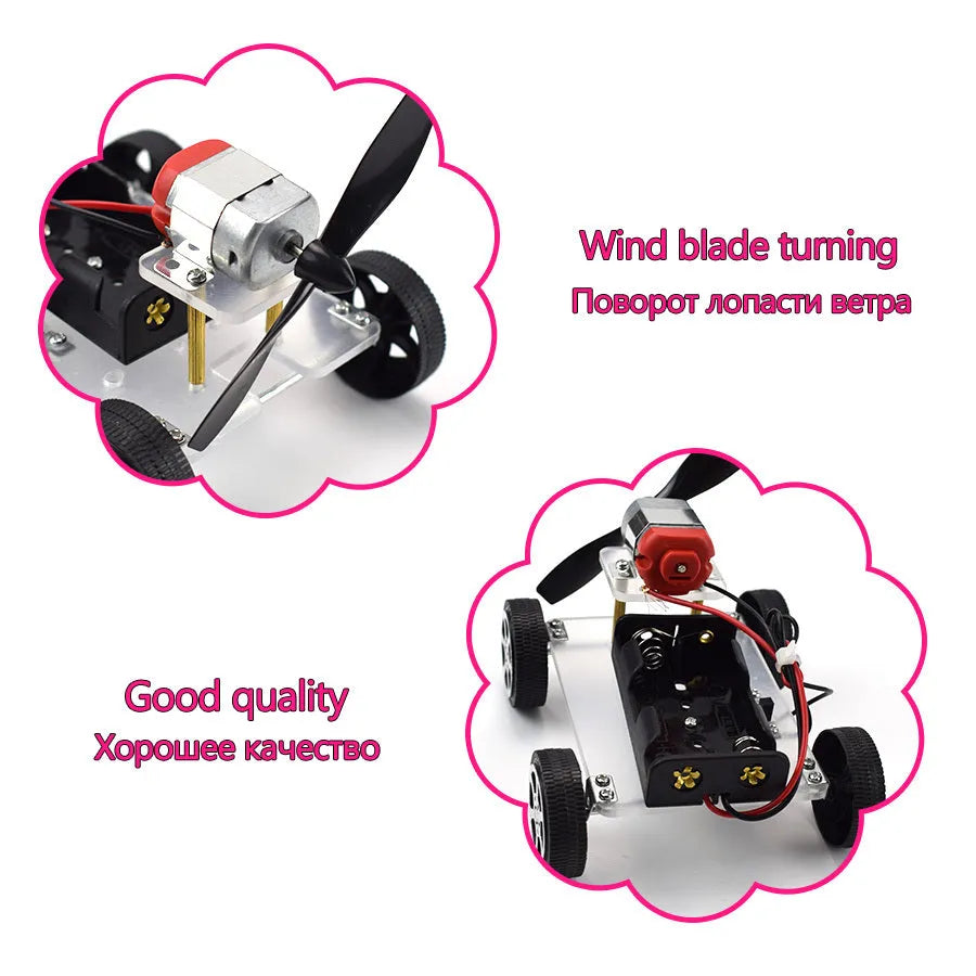 Assembled DIY wind car science experiment kit with acrylic, metal, and plastic parts on a table.