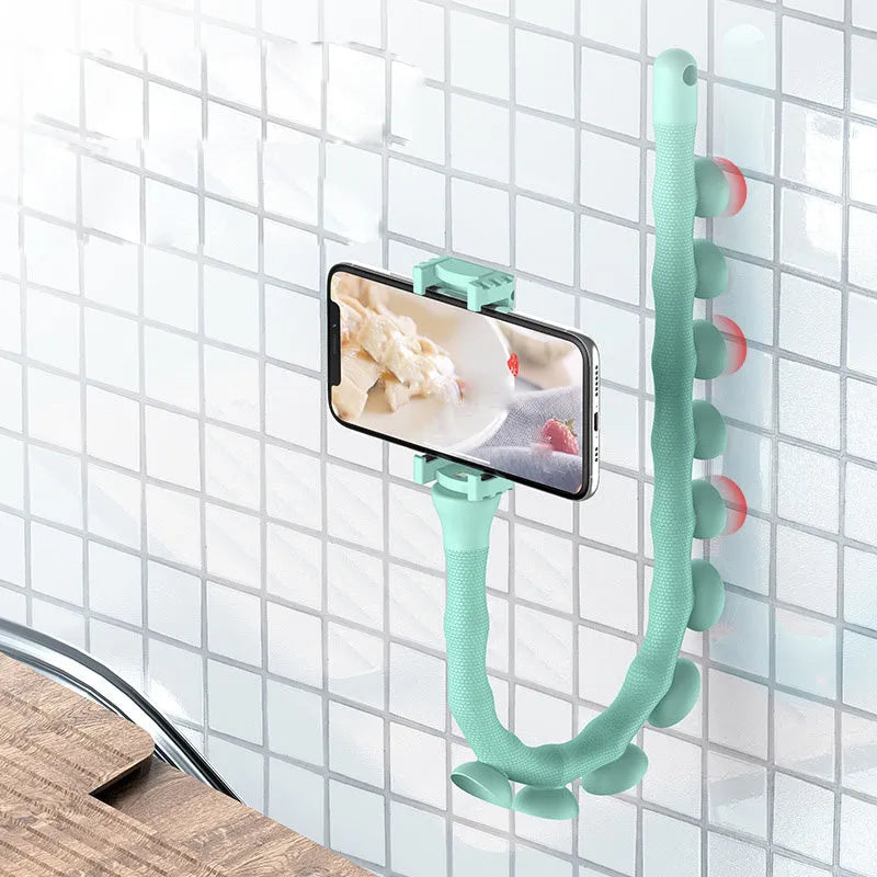 Black flexible rubber phone holder with suction cup bent into shape showing 62cm length