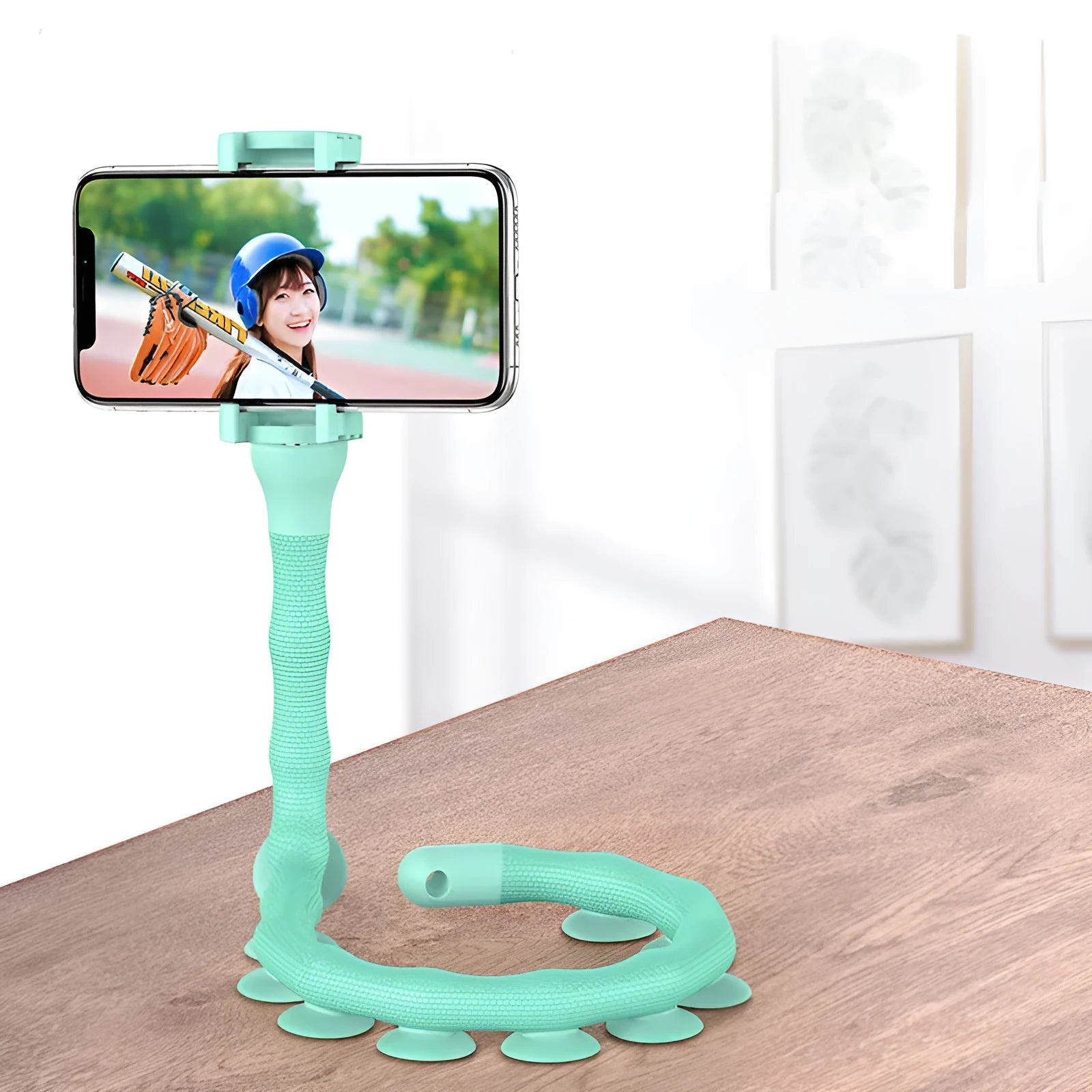 Black flexible rubber phone holder with suction cup bent into shape showing 62cm length