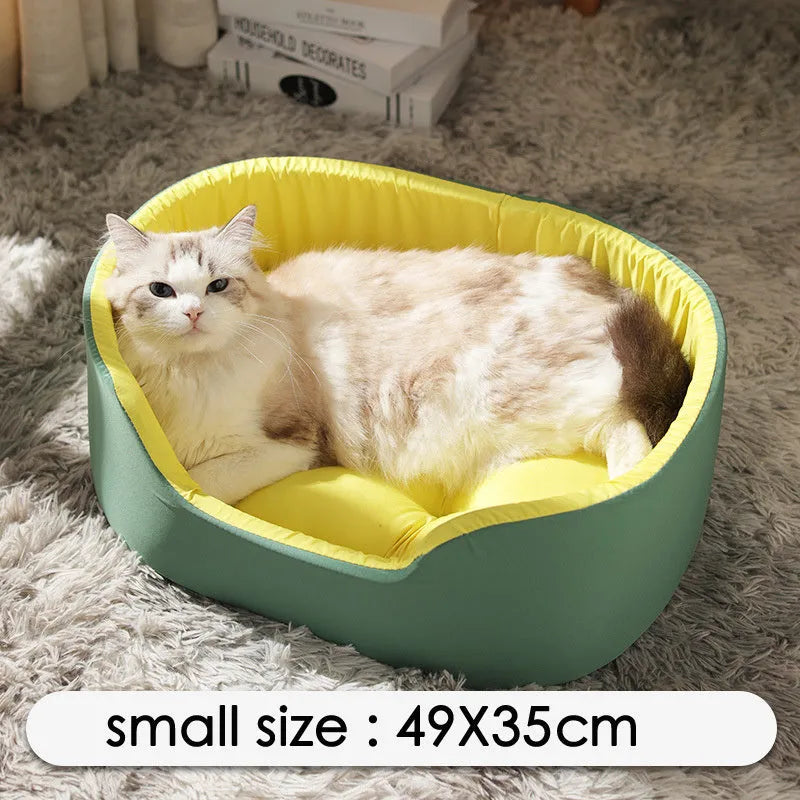 A green washable cloth pet kennel bed for cats or dogs, shown in a medium size.