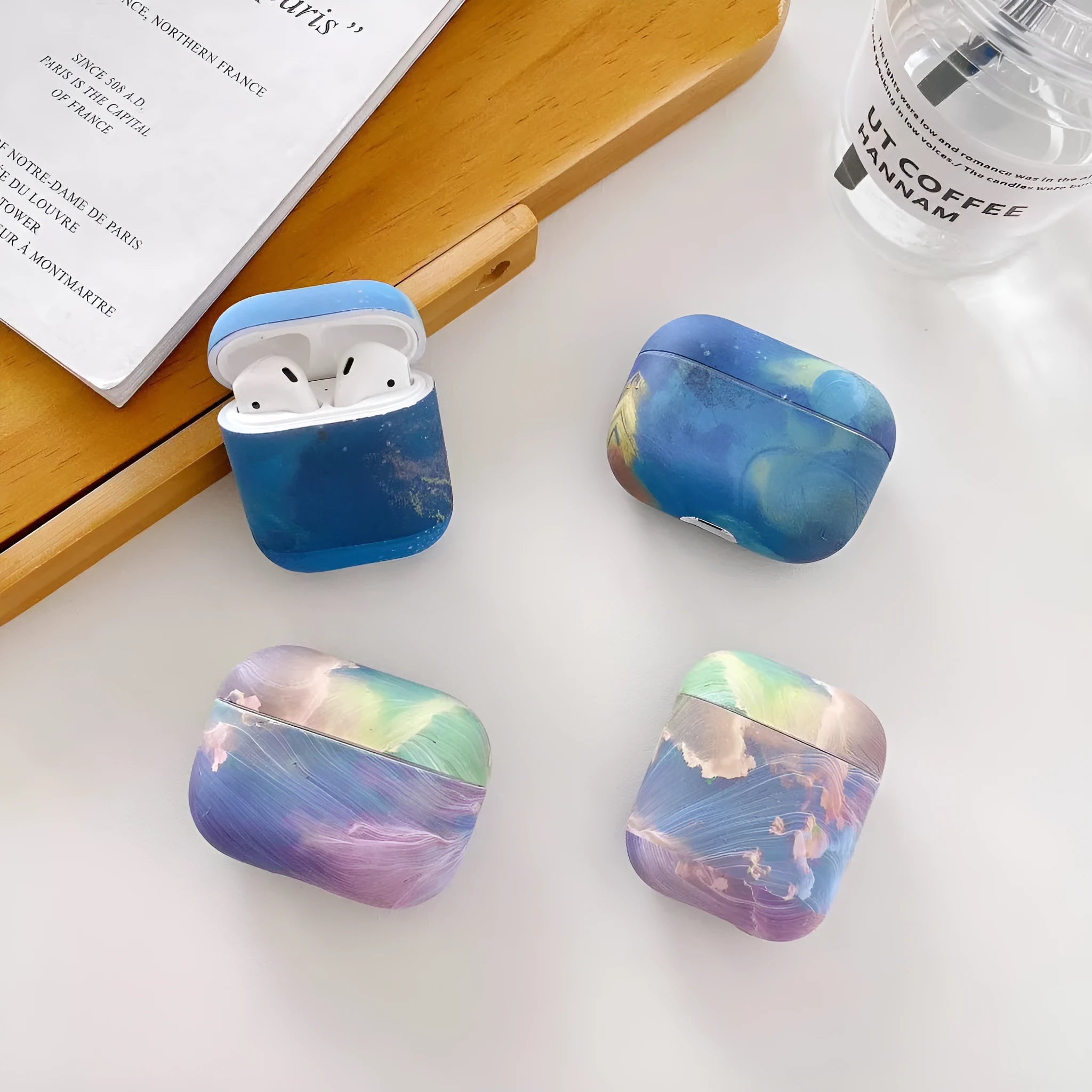 Pink watercolour hard plastic protective sleeve case for Apple AirPods Pro charging case.