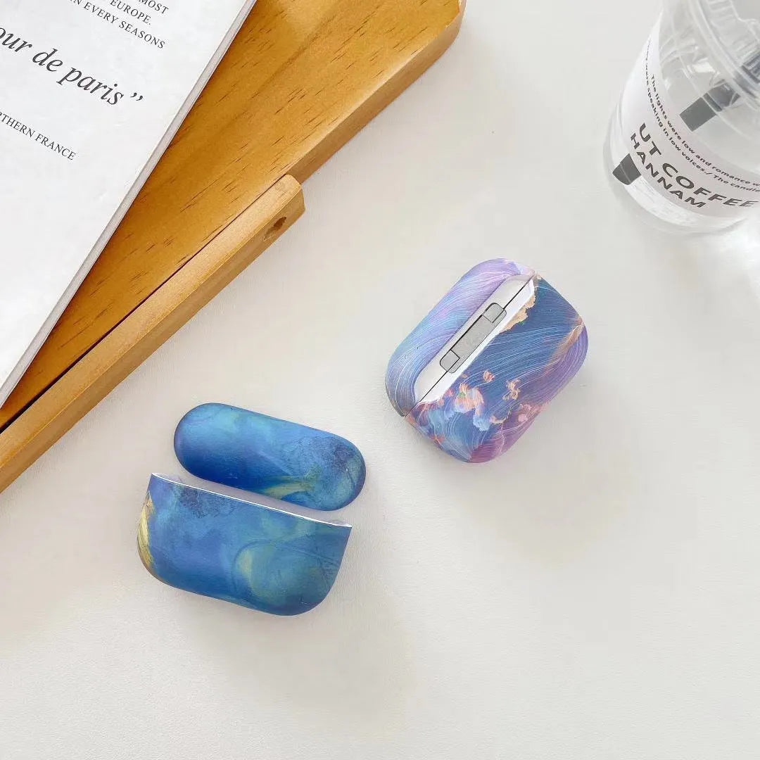 Pink watercolour hard plastic protective sleeve case for Apple AirPods Pro charging case.