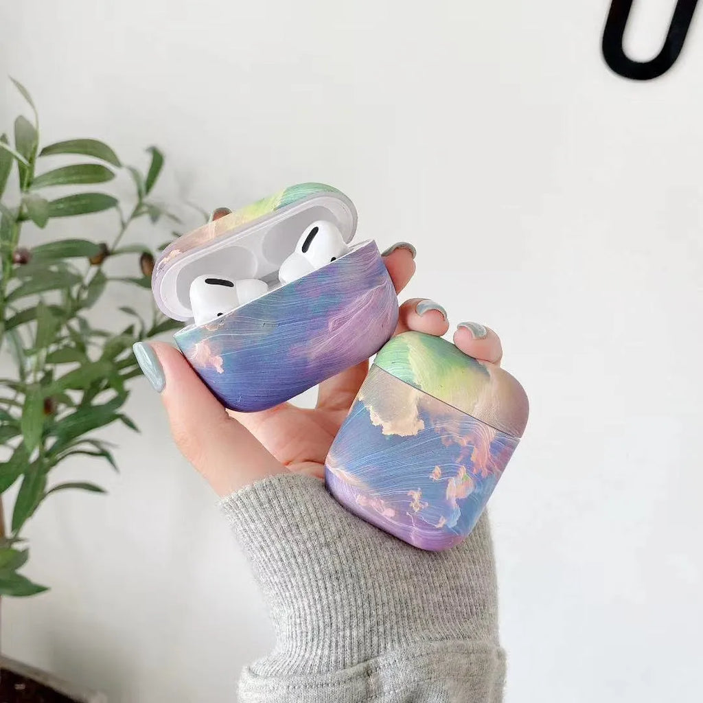 Pink watercolour hard plastic protective sleeve case for Apple AirPods Pro charging case.