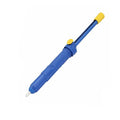 Blue manual solder sucker desoldering tool with silver nozzle on a workbench.