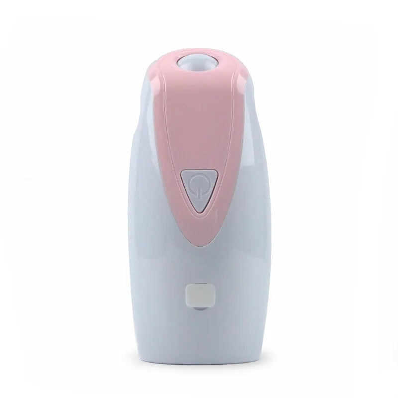 Green USB charging automatic rotating laser cat toy with ABS plastic body on a table