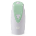 Green USB charging automatic rotating laser cat toy with ABS plastic body on a table