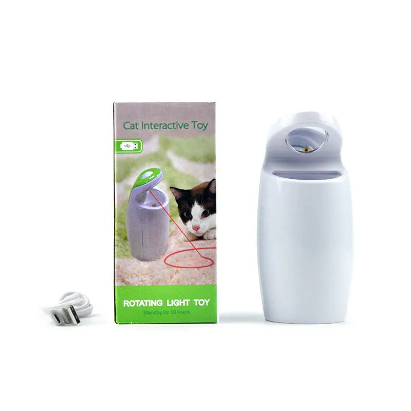 Green USB charging automatic rotating laser cat toy with ABS plastic body on a table