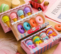 Set of 12 colourful cartoon erasers shaped like ice creams, lollipops, and donuts for children
