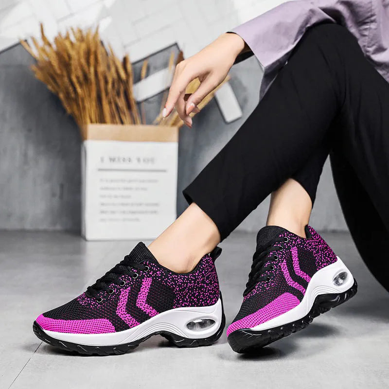 Women's air cushion heightening sports shoes in black with flying weave upper and lace closure