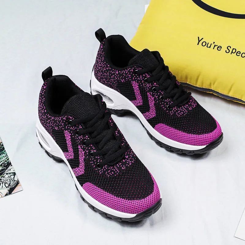 Women's air cushion heightening sports shoes in black with flying weave upper and lace closure