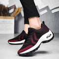 Women's air cushion heightening sports shoes in black with flying weave upper and lace closure