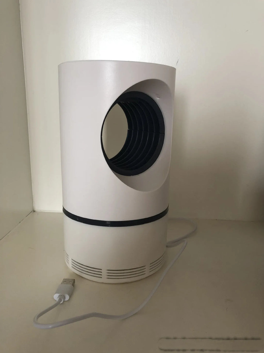 White large bionic mosquito killer lamp with violet light and USB power for indoor use