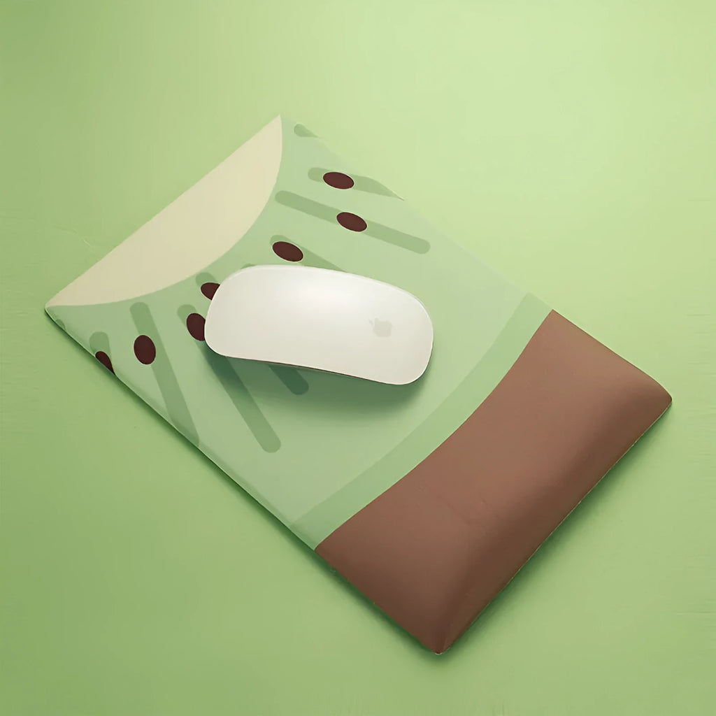 Kiwi fruit design on a grey cloth mouse pad with a thick, integrated gel wrist rest at the front.