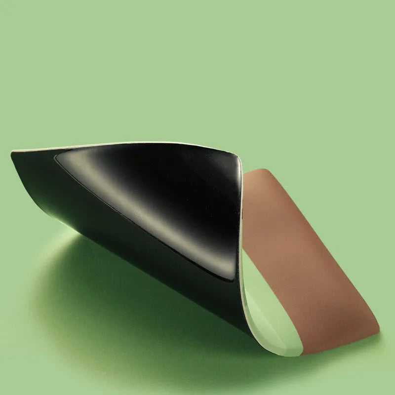 Kiwi fruit design on a grey cloth mouse pad with a thick, integrated gel wrist rest at the front.