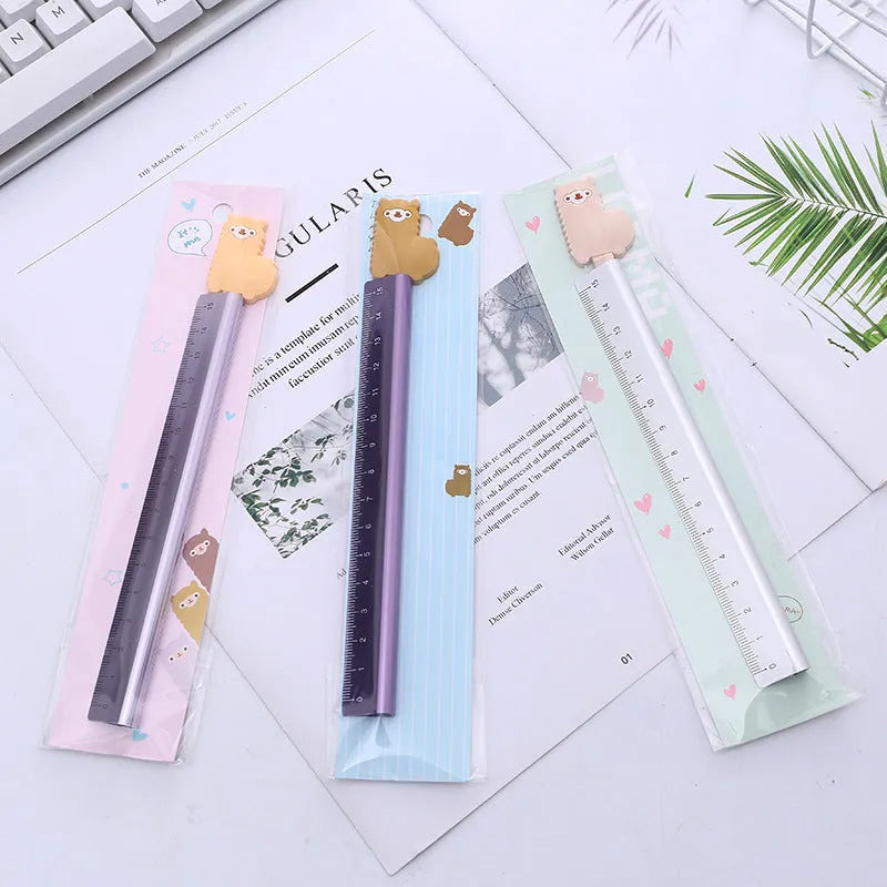 Aluminium straight ruler tool with measurement graduations in random design colour
