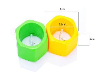 Yellow and green spiral vegetable cutter kitchen tool with food-grade ABS plastic construction.