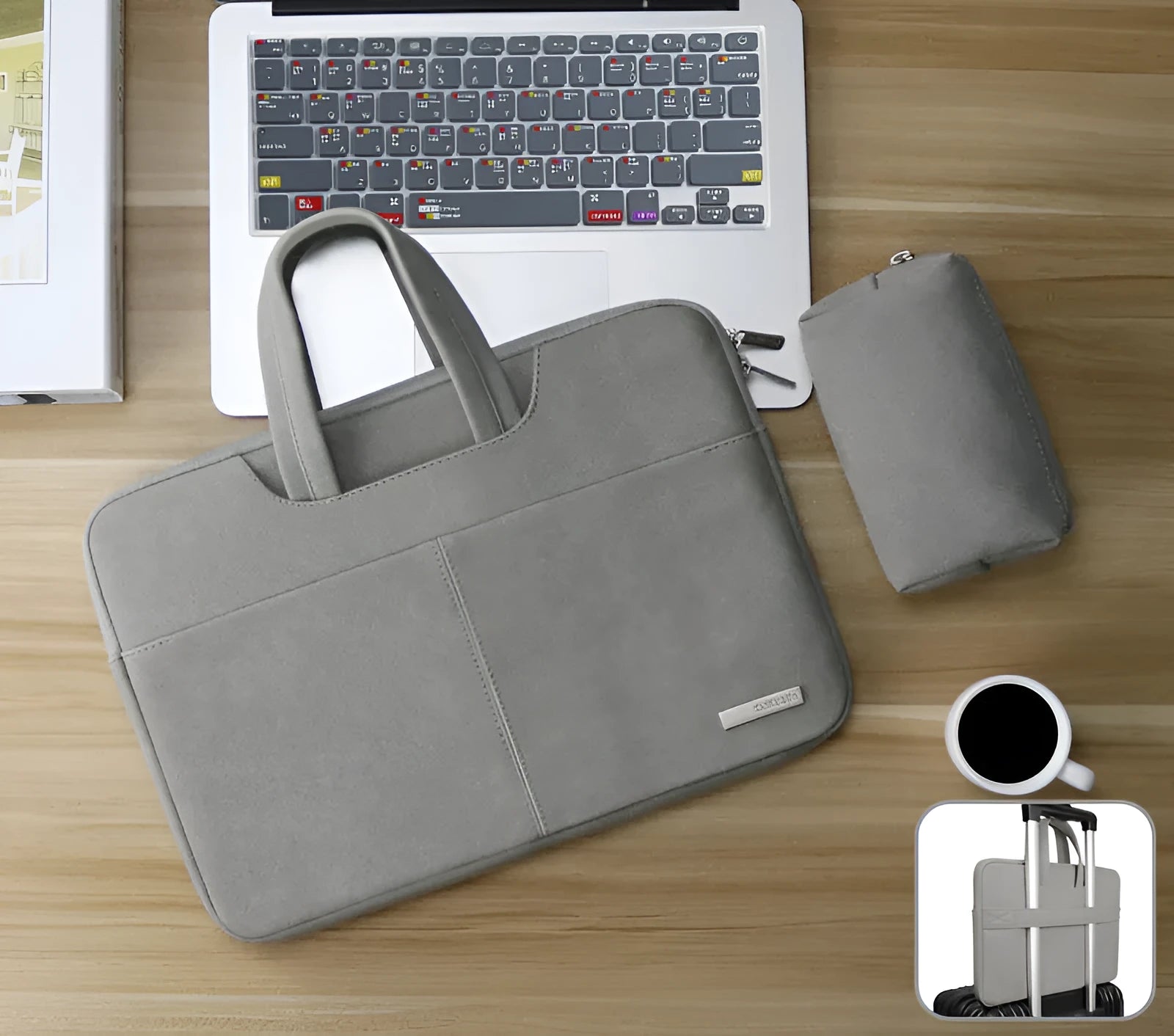 Blue universal laptop sleeve with zipper open, showing internal padded liner and organiser pockets for phone and ID.