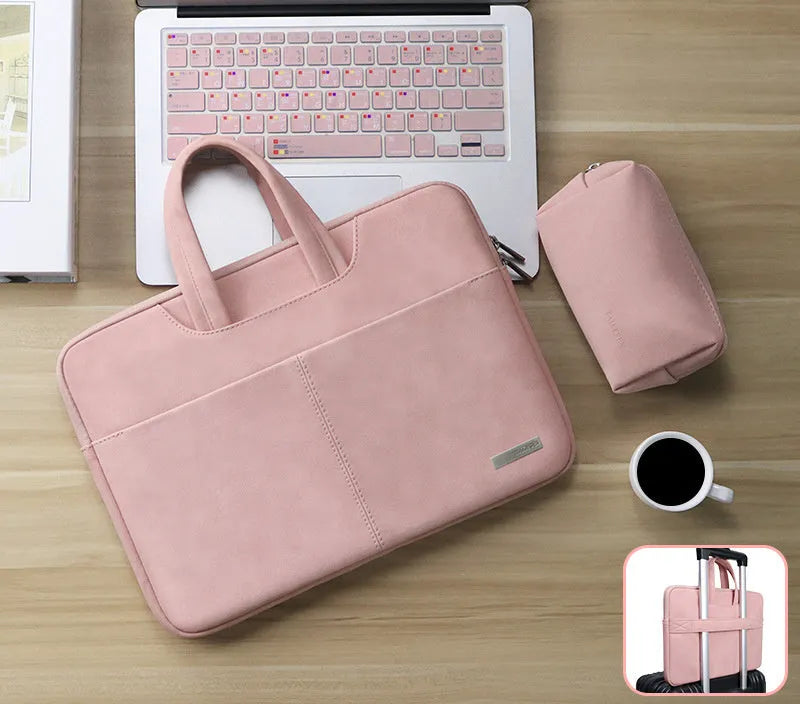 Blue universal laptop sleeve with zipper open, showing internal padded liner and organiser pockets for phone and ID.