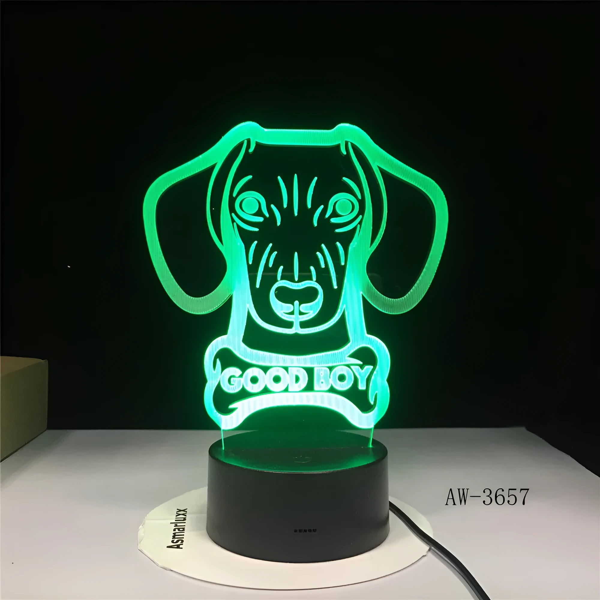 A colourful gradient acrylic remote control touch LED table lamp on a desk with a USB cable.