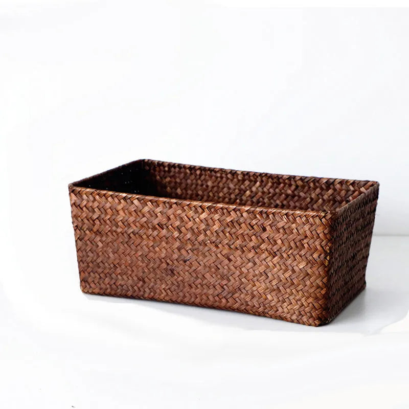 Natural straw storage box for desk organisation in brown colour with stationery inside