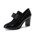 Women's patent leather high heel shoes with thick block heel in black and red colour options