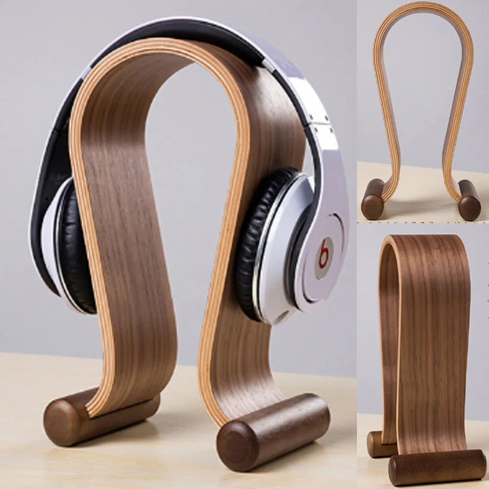 Solid wood earphone display rack with natural wood grain finish on desk