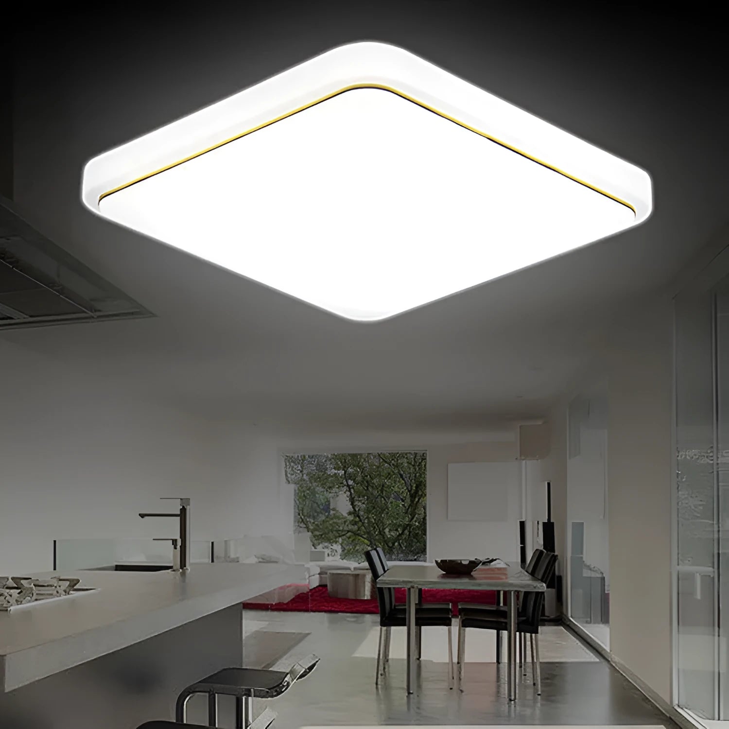Square LED ceiling lamp with gold line trim on ceiling in a living room setting
