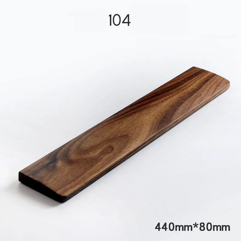 Walnut wood mechanical keyboard wrist rest showing natural wood grain finish